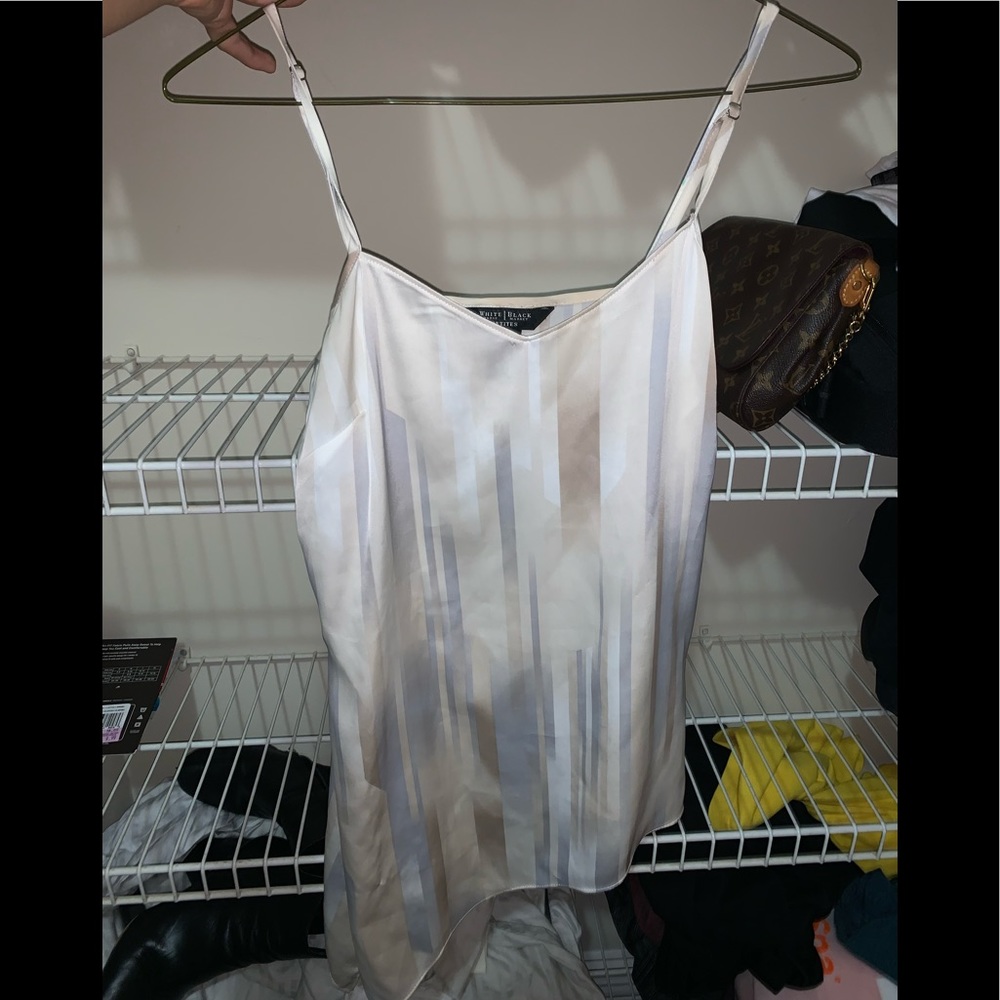 Asymmetrical hemline top